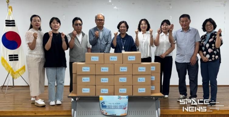 지난해 기장군 여름안전 협의체 '쿨한 마을안전발굴단'이 기념촬영을 하고 있다